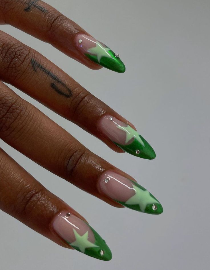 Bold Almond-Shaped Nail Design with Vibrant Green Accents and Sparkling Rhinestones.