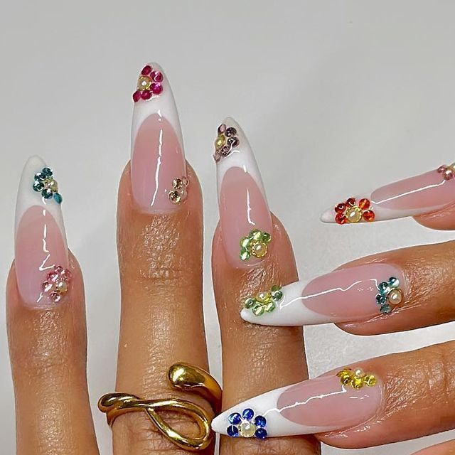 Sophisticated Almond-Shaped Nails with Colorful Floral French Manicure Design.