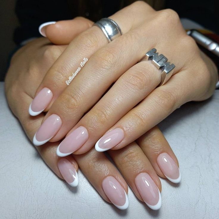 Sophisticated Almond-Shaped Nails: Soft Pink Base with Classic White Tips