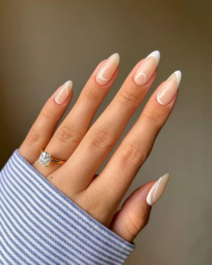 Elegant Almond-Shaped Nails with Ombre and Geometric Accents.