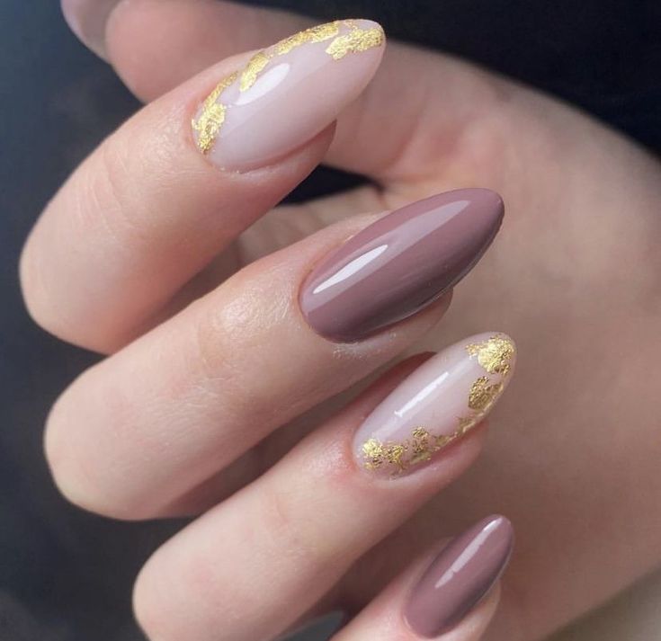 Sophisticated Neutral Nail Design with Soft Pink, Mauve, and Gold Accents.