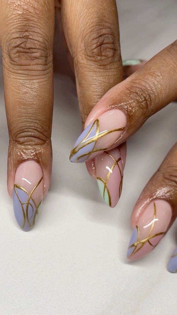 Chic Pastel Nail Art with Gold Accents for a Sophisticated Touch