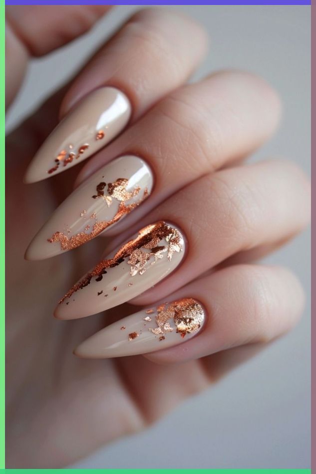 Sophisticated Almond-Shaped Nails with Nude Base and Metallic Rose Gold Accents