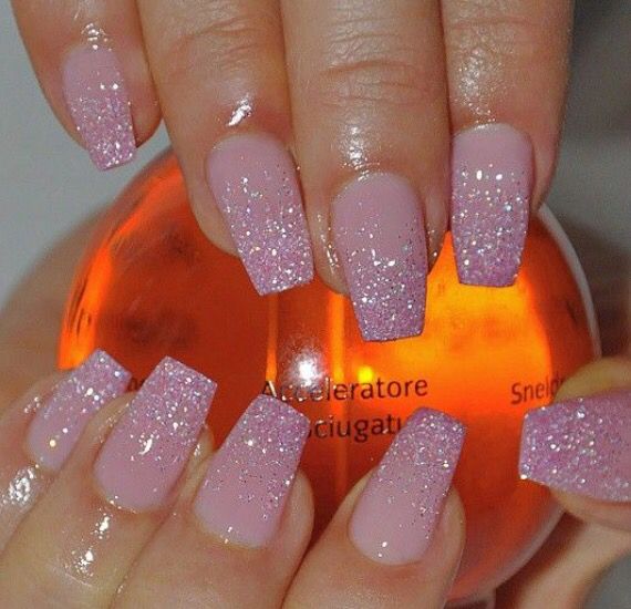 Elegant Glittering Ombre Nails: A Stylish Blend of Soft Pink and Sparkling Translucent Tips