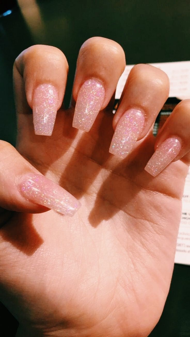 Chic Sparkling Nail Design with Elongated Square Shape and Elegant Pink Glitter Finish.