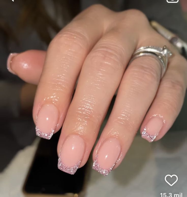 Chic Pink Manicure with Sparkling Silver French Tips for Any Occasion