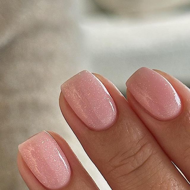 Elegant Soft Pink Square Nails with Subtle Shimmer for Versatile Style.