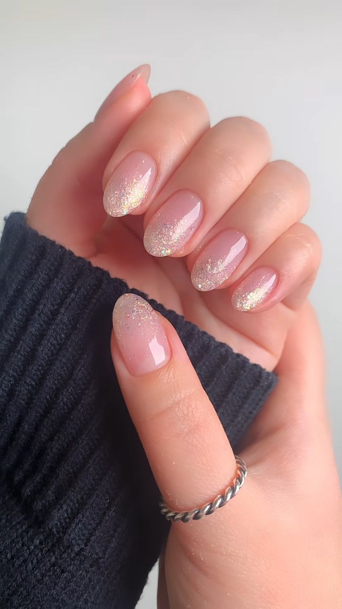 Chic Soft Pink Nail Design with Iridescent Glitter Gradient Tips.