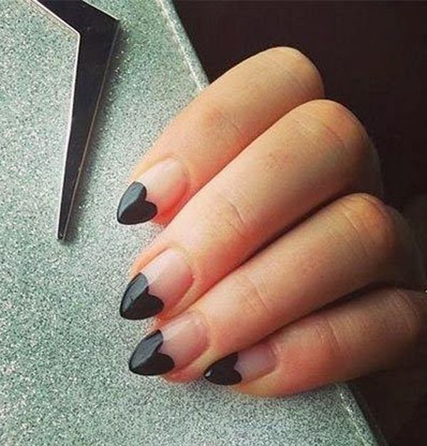 Chic Heart-Shaped Nail Design: Elegant Nude and Glossy Black Finish for Romantic Style.