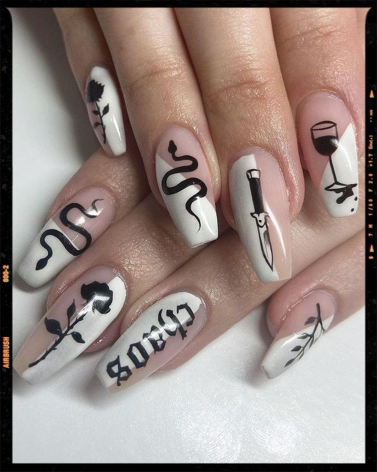 Bold Black and White Nail Art with Unique Graphic Illustrations