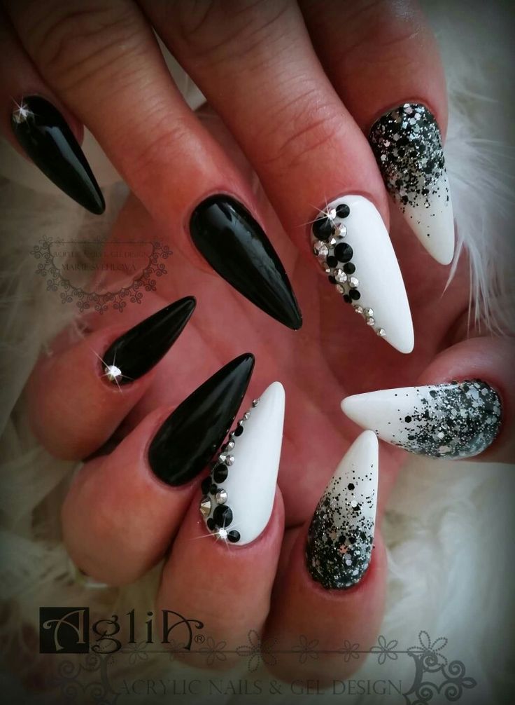 Bold Black and White Nail Design with Glitter and Rhinestones