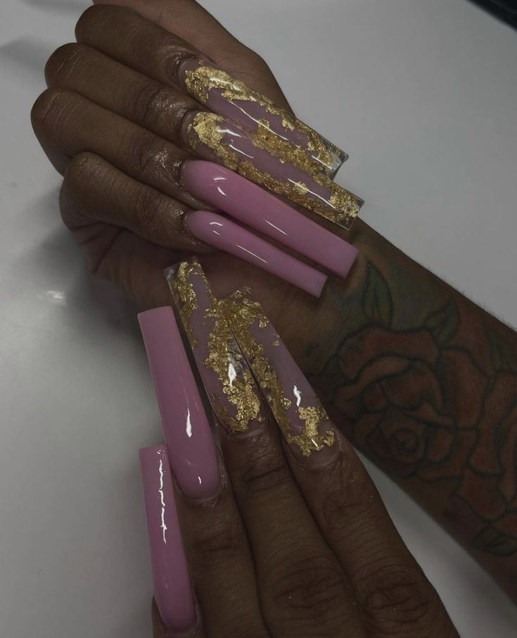 Luxurious Nail Design: Soft Pink with Glamorous Gold Accents