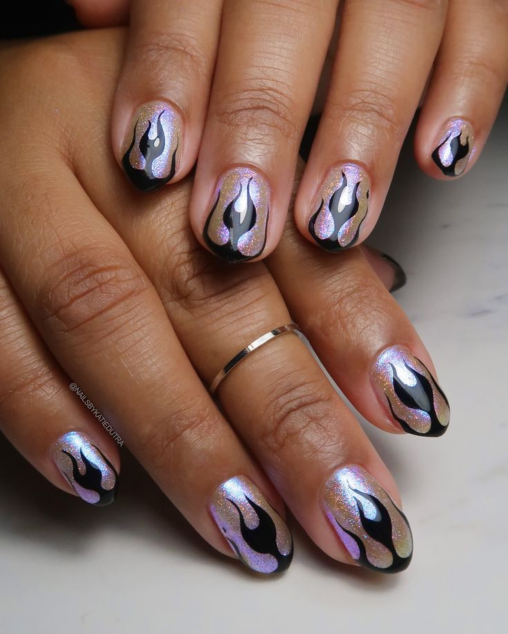 Bold Flame-Themed Nail Design with Shimmering Holographic Base and Glossy Black Accents.