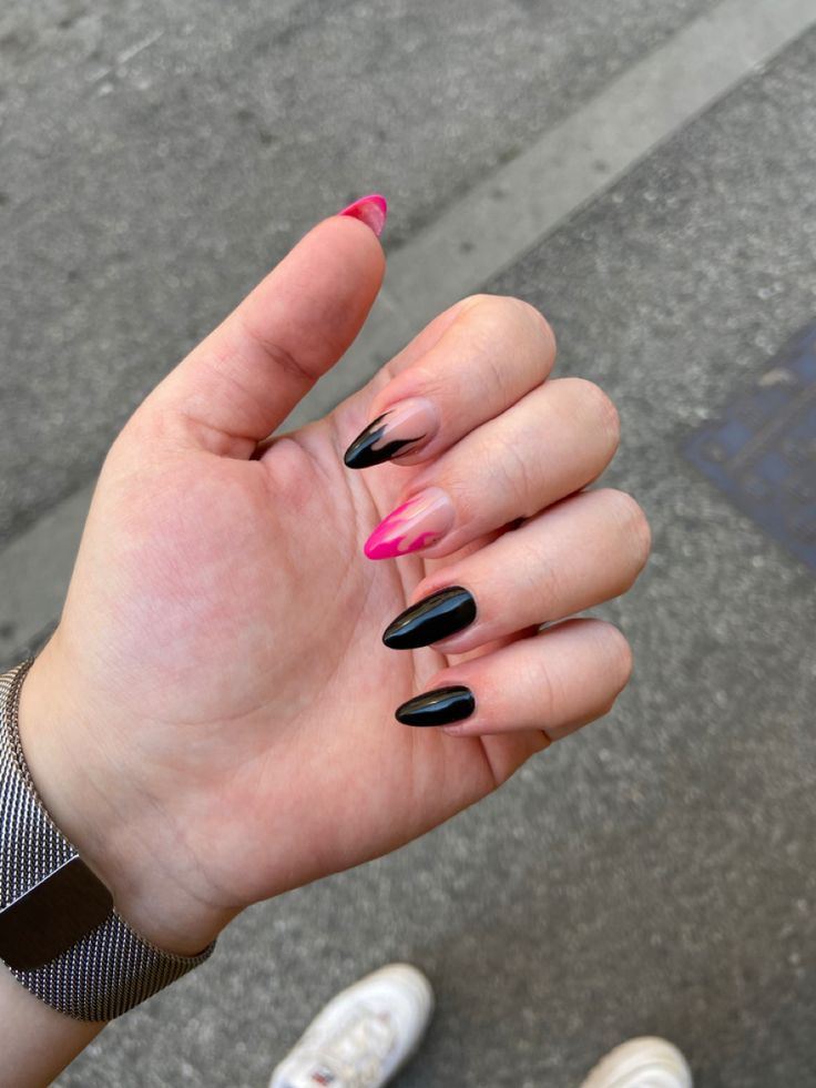 Bold and Modern Nail Design: Striking Black and Pink Gradient with Geometric Shapes.