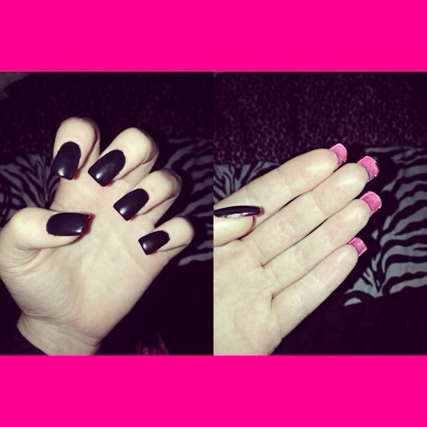 Contrasting Elegant Nail Designs: Bold Black Gloss Meets Playful Pink Tips.