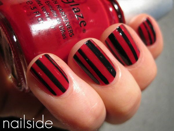 Chic Bold Striped Black and Red Nail Design for Any Occasion