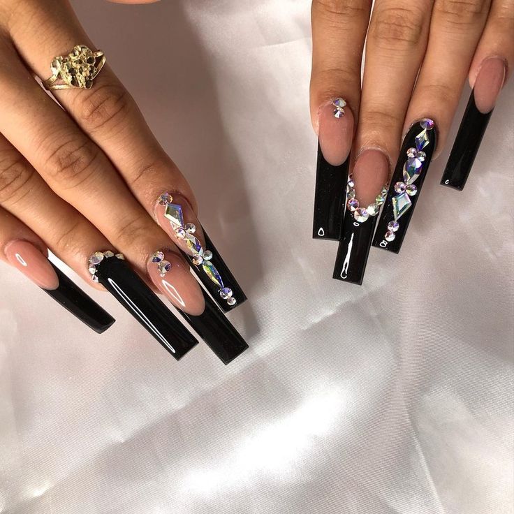 Striking Elegant Nail Art: Glossy Black Acrylics with Rhinestones and Nude Accents