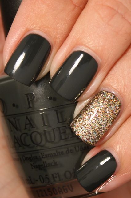 Sophisticated Dark Green Nail Design with Glitter Accent for a Glamorous Edge.