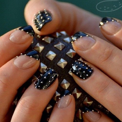 Edgy Glossy Black and Metallic Stud Nail Design for a Bold Statement.