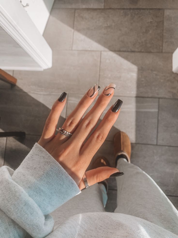 Chic Black and Nude Nail Design with Geometric Patterns for Sophisticated Casual Style