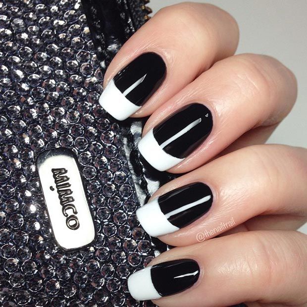 Chic Black and White French Tip Nail Design: A Timeless Elegance.