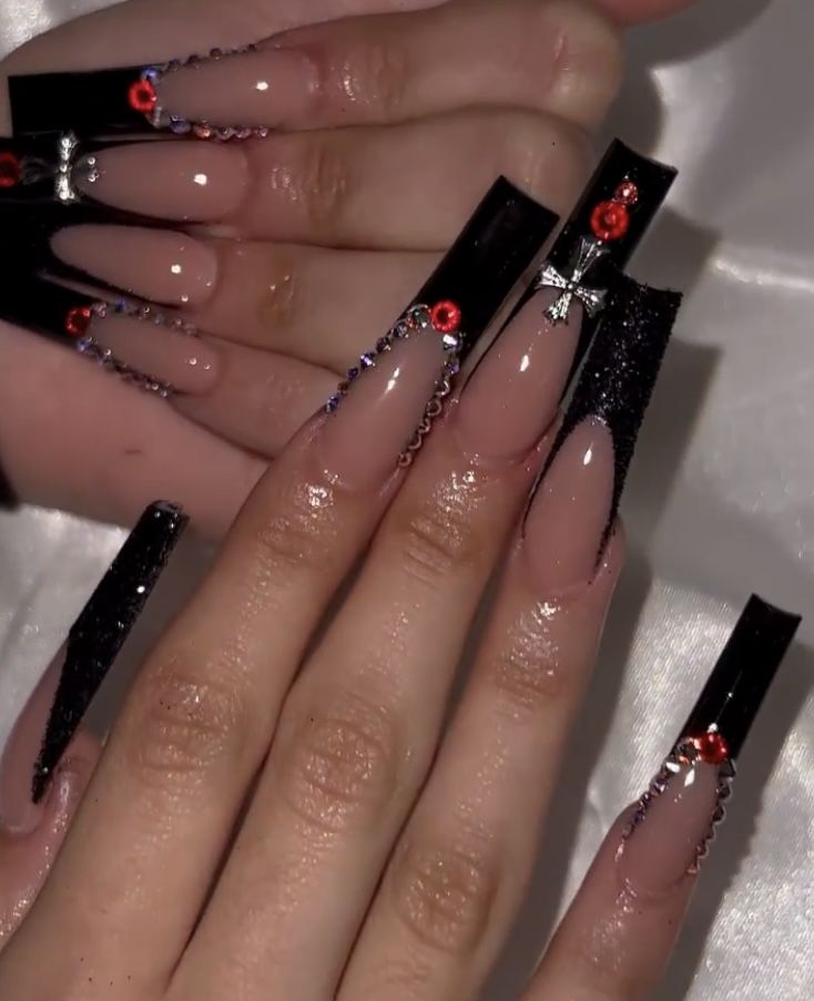 Elegant Black Long Nail Extensions with Sparkling Gems and Silver Accents.