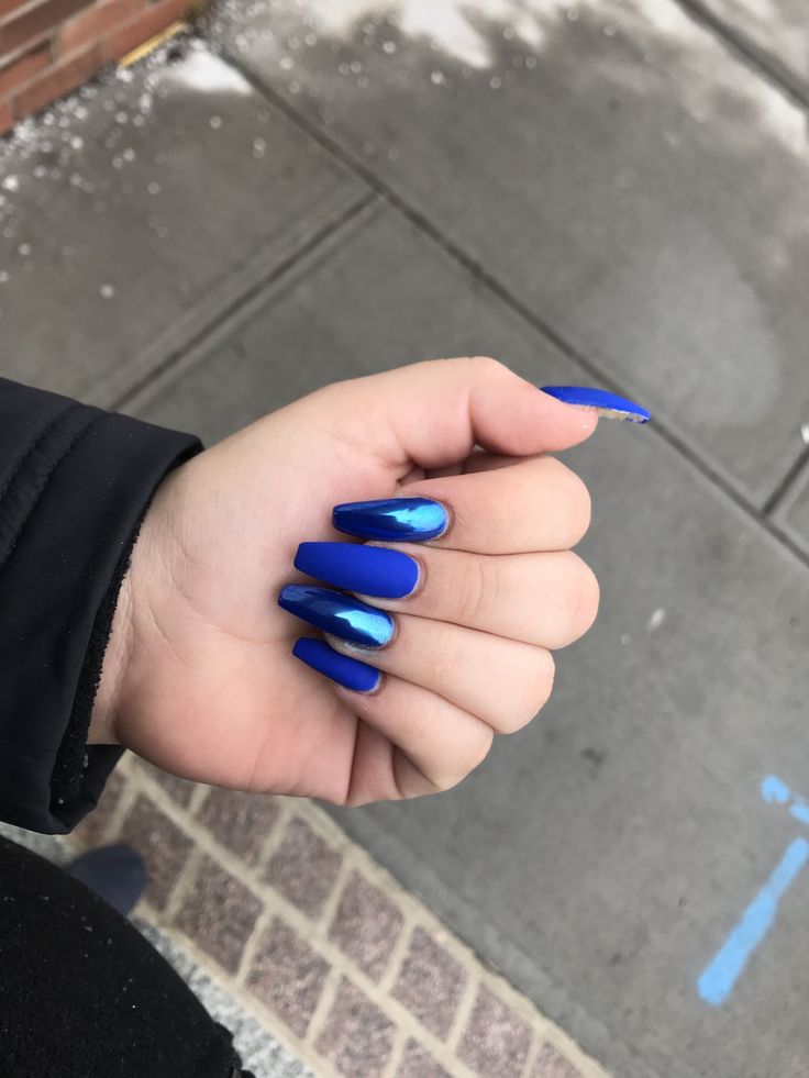 Stunning Ombre Blue Nail Design with Glossy Finish and Elegant Long Shape.