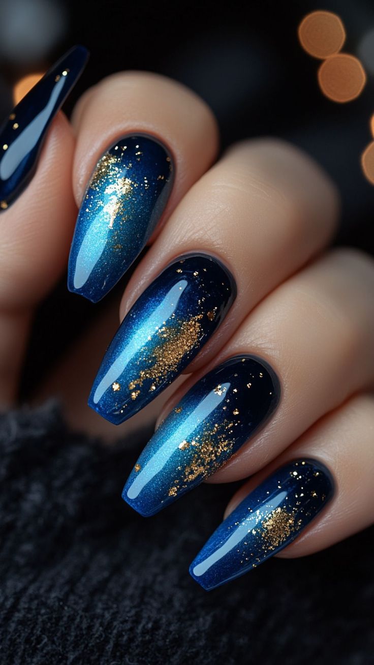 Elegant Gradient Blue Nail Design with Sparkling Gold Accents for Special Occasions