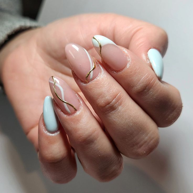 Chic Pastel Nail Design with Delicate Gold Accents for Sophisticated Elegance.