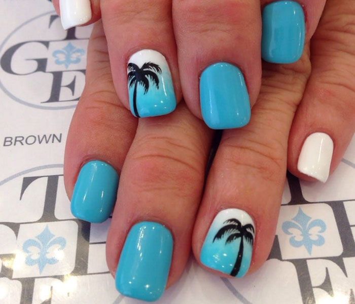 Vibrant Tropical Nail Design: Blue Base with White Palm Tree Accents for Summer Style.