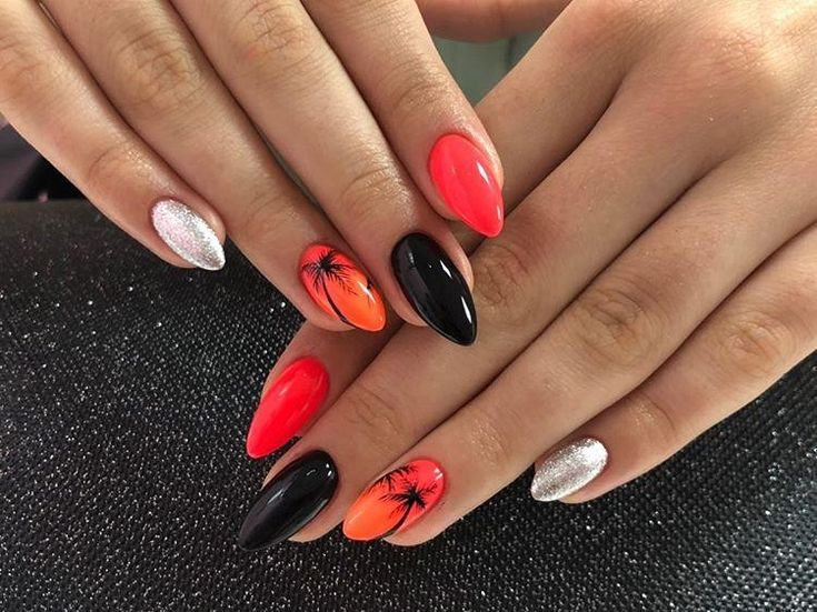 Bold and Festive Tropical Nail Designs with Striking Sunset Colors and Sparkling Accents.