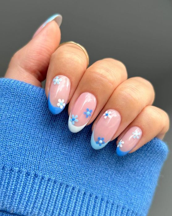 Whimsical Pastel Floral Nail Design with Soft Pink Base and Blue Gradient Tips