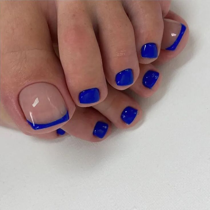 Vibrant Bold Blue Nail Design: A Fresh, Eye-Catching Combination of Accents and Clean Base.