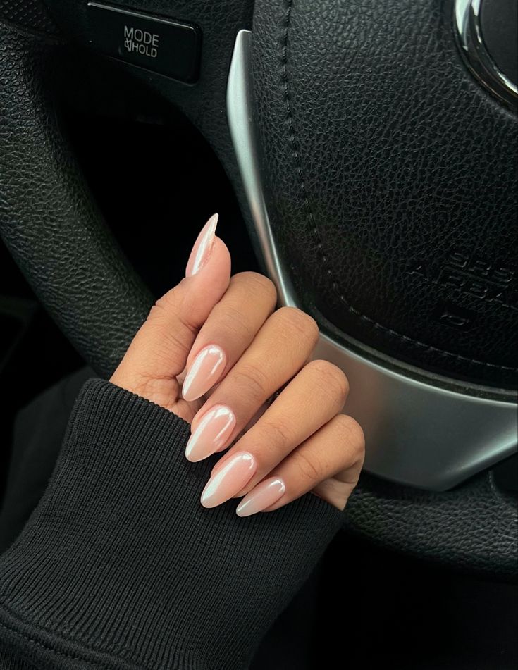 Sophisticated Chic: Elegant Almond-Shaped French Manicure with Glossy Nude Base and Crisp White Tips.