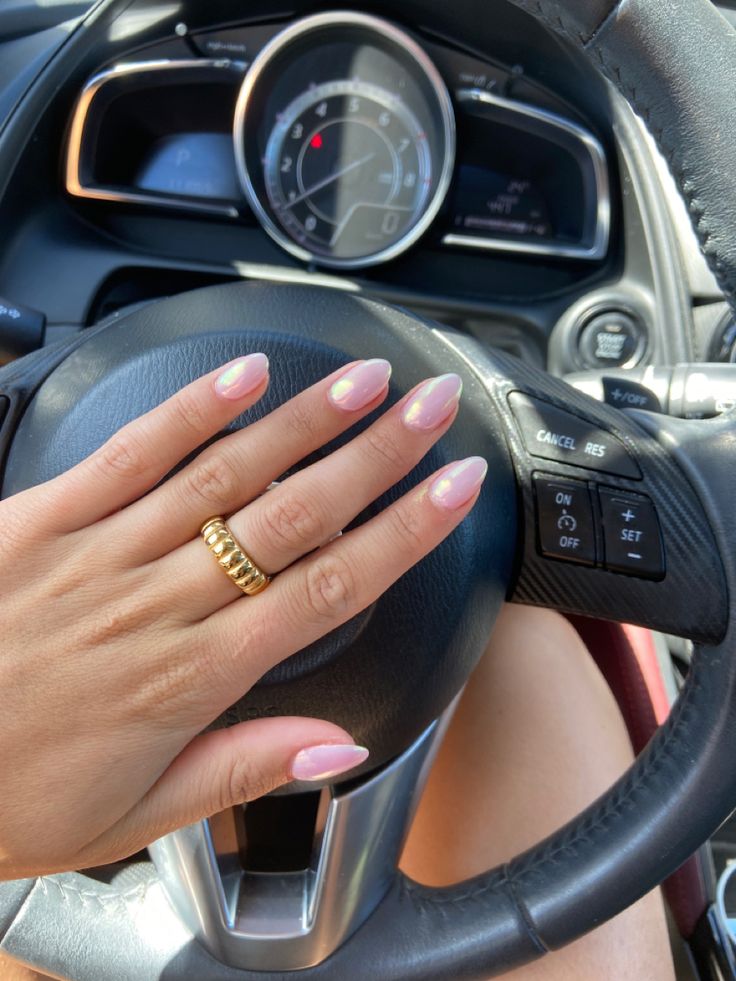 Chic Soft Pink Gradient Nail Design with Shimmer and Elongated Shape.