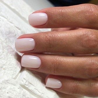 Elegant Nude Nail Design: Versatile Sophistication with a Glossy Finish.