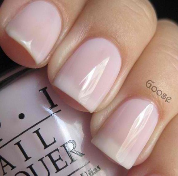 Chic Modern French Manicure: Soft Pink Base with Glossy Finish and Subtle White Tips.