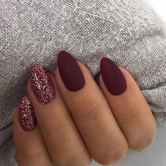 Sophisticated Matte Burgundy and Glitter Oval Nail Design for Any Occasion.