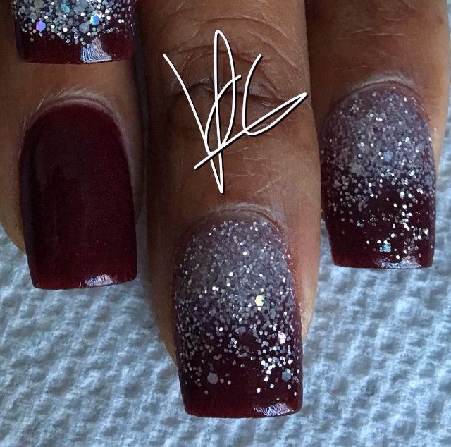 Elegant Ombre Nail Design: Burgundy to Sparkling Silver Gradient with Glitter Tips.