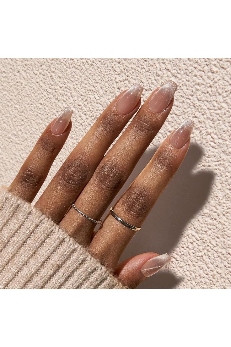 Chic Almond-Shaped French Manicure with Subtle Shimmer and Minimalist Silver Accents