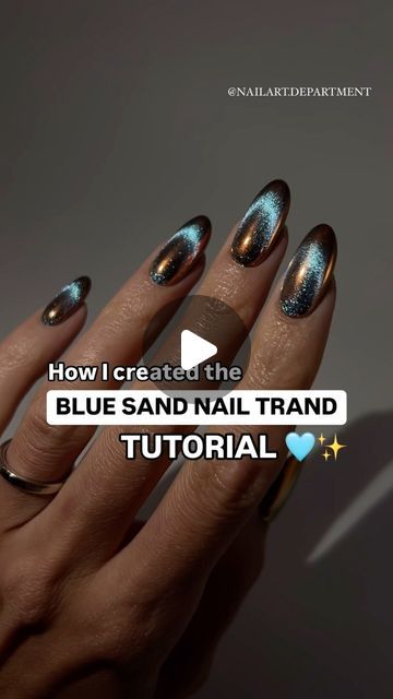 Captivating Blue Sand Nail Design: A Glamorous and Textured Trend.