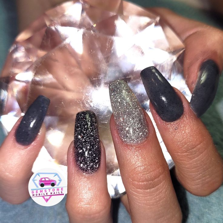 Elevate Your Style: Elegant Nail Design with Dark Shades and Glitter Accents