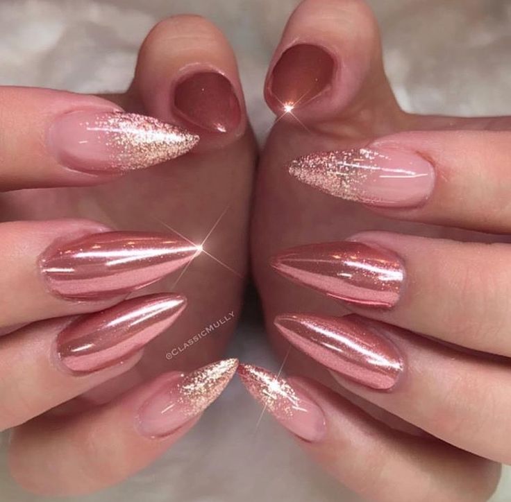 Sophisticated Almond and Stiletto Nail Design in Soft Nude and Shimmering Rose Gold