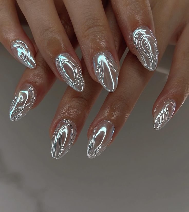 Iridescent Wave Design on Almond-Shaped Nails for a Striking Look.