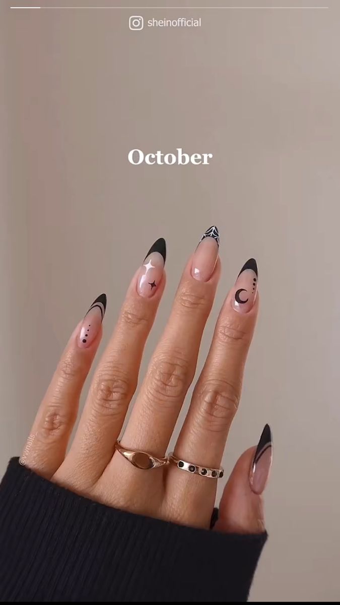 Autumn-Inspired Elegant Nail Design with Nude and Black Celestial Motifs