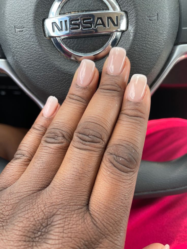 Timeless Elegant Nude Nail Design with Subtle French Tips for Any Occasion.