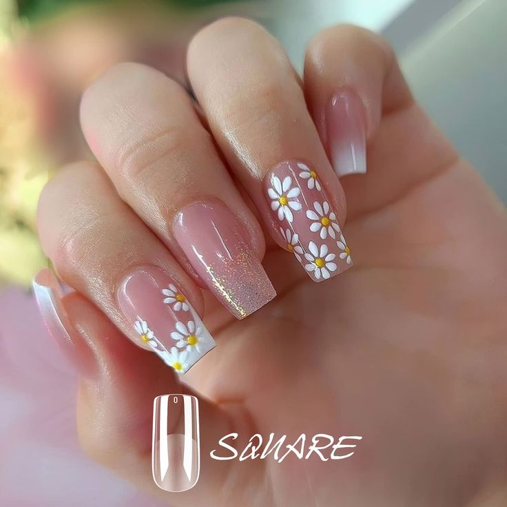 Elegant Pink Nail Design with Floral Accent and Subtle Shimmer.