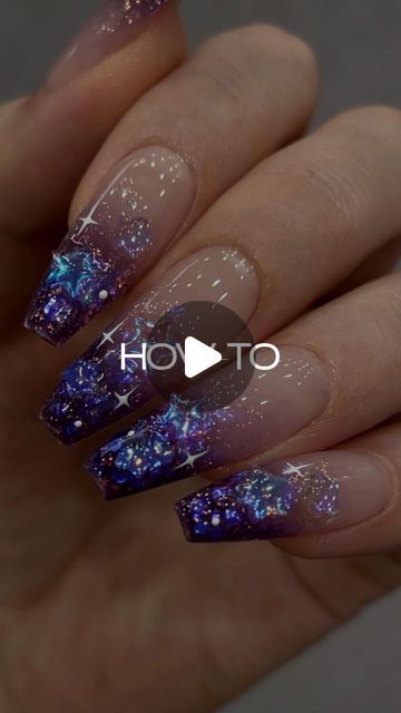 Galactic Glam: Stunning Deep Purple and Shimmering Blue Gradient Nails with Sparkling Designs.