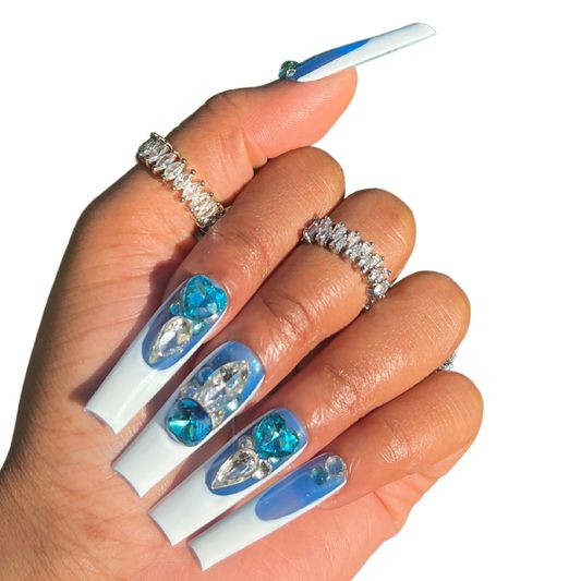 Elegant Long Square Nails with Glossy White Finish and Sparkling Gemstone Accents