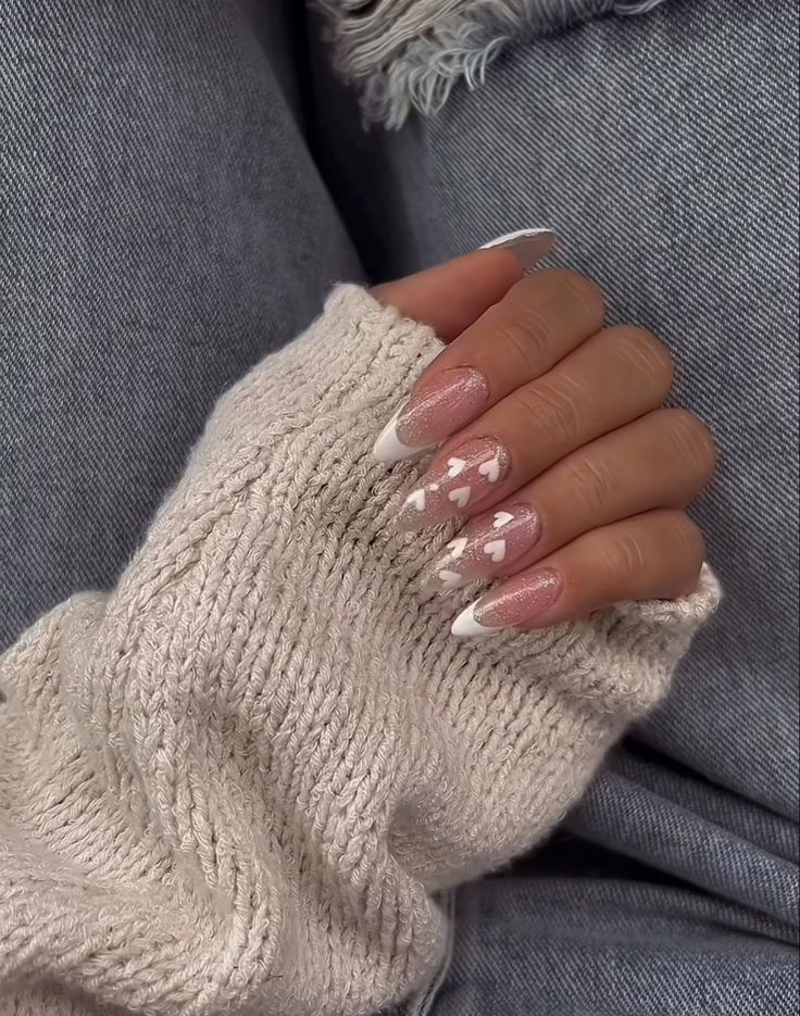 Chic and Romantic Nail Design: Soft Pink and Classic White with Heart Patterns and French Tips